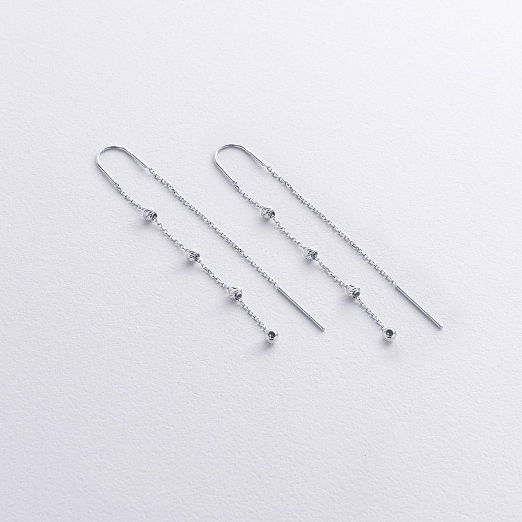 Серьги - протяжки с шариками (белое золото) с09057 от ювелирного магазина Оникс
