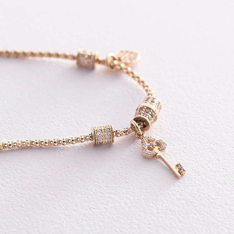 Золотой браслет "Ключик" с фианитами б04013 от ювелирного магазина Оникс - 2