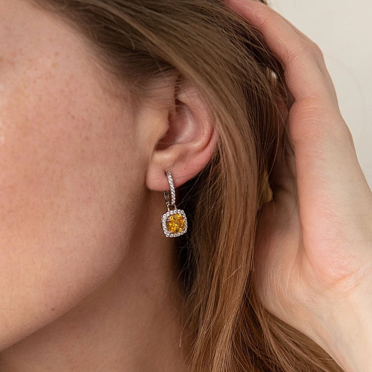 Срібні сережки з білими і жовтими фіанітами 123043 від ювелірного магазину Онікс - 1