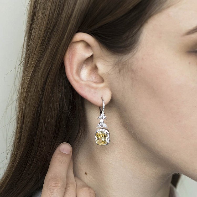 Срібні сережки з фіанітами 121826 від ювелірного магазину Онікс