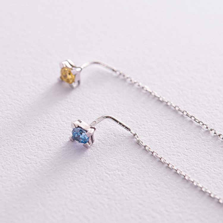 Серьги - протяжки в белом золоте (голубые и желтые фианиты) с08122 от ювелирного магазина Оникс - 2