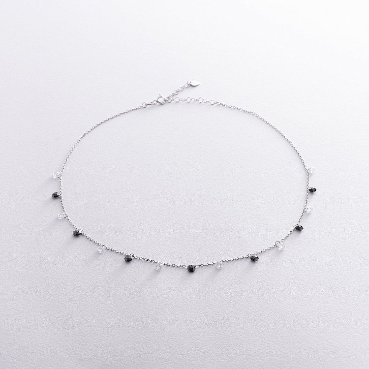 Срібне кольє з чорними і білими фіанітами 181271 від ювелірного магазину Онікс