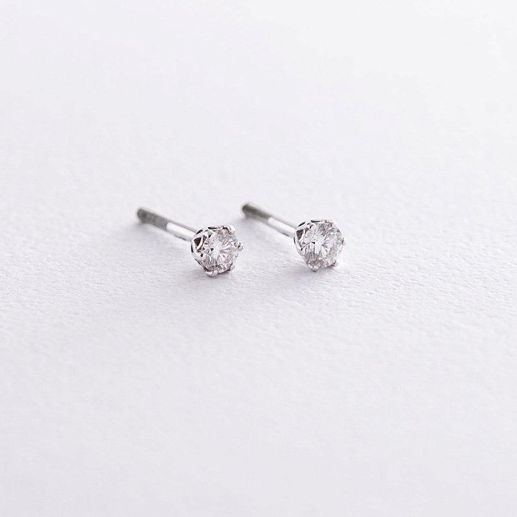 Сережки - пусети в білому золоті (діаманти) сб0240 від ювелірного магазину Онікс