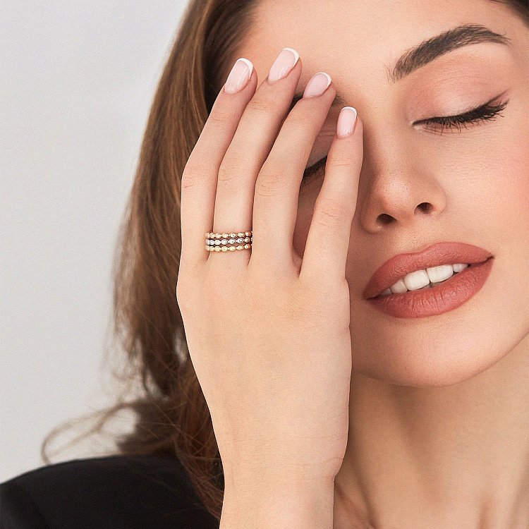 Набір з трьох золотих каблучок "Кульки" к06718 від ювелірного магазину Онікс - 10