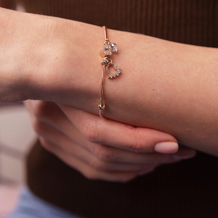 Золотий браслет "Сердечки" з фіанітами б05021 від ювелірного магазину Онікс - 5