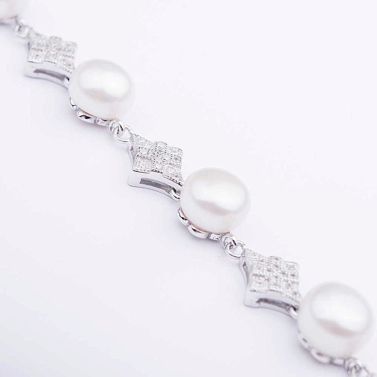 Браслет з фіанітами і культ. прісн. перлами 141024 - 2 Браслет з фіанітами і культ. прісн. перлами 141024 від ювелірного магазину Онікс - 2