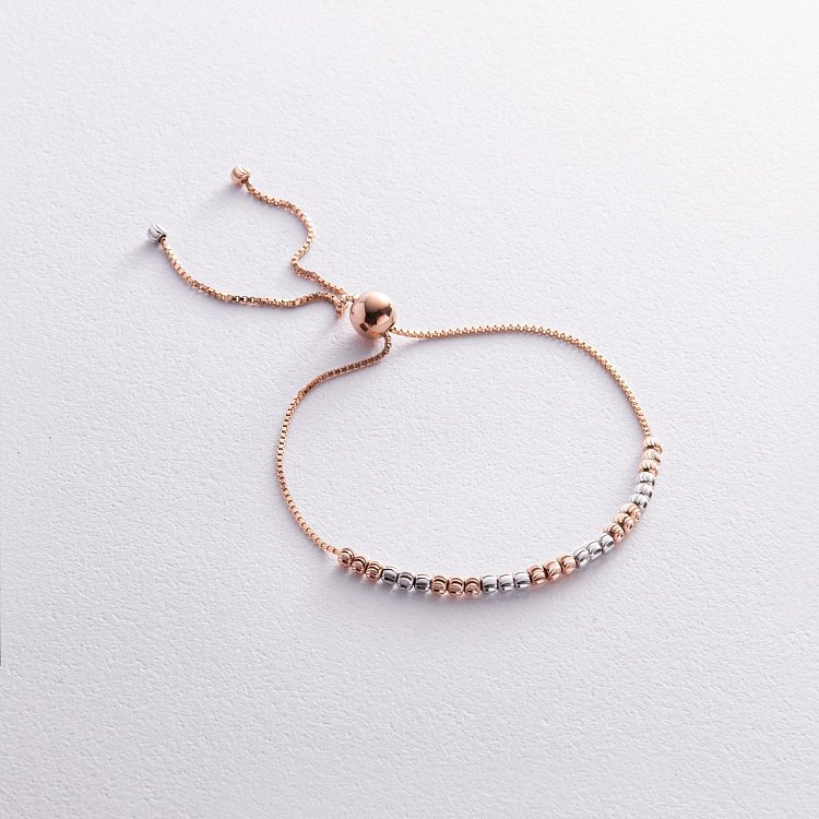 Браслет "Кульки" (червоне, біле золото) б05271 від ювелірного магазину Онікс