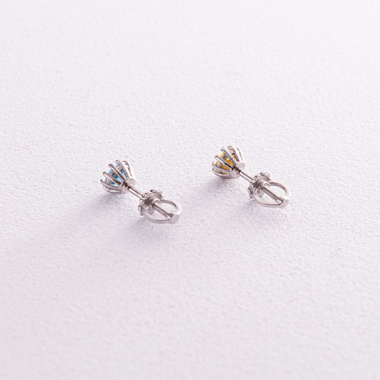 Срібні сережки - пусети (блакитне та жовте каміння) 308 від ювелірного магазину Онікс - 4