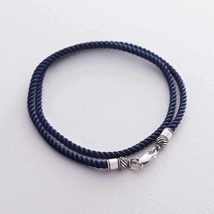 Шовковий синій шнурок зі срібною застібкою (3 мм) 18425 від ювелірного магазину Онікс