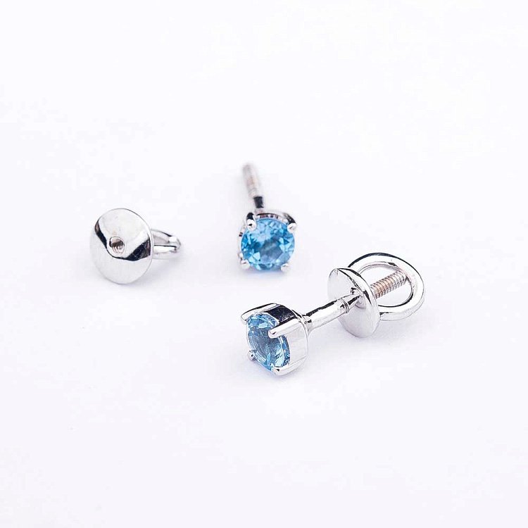 Золоті сережки-пусети з блакитним топазом СТД2-154 від ювелірного магазину Онікс - 1