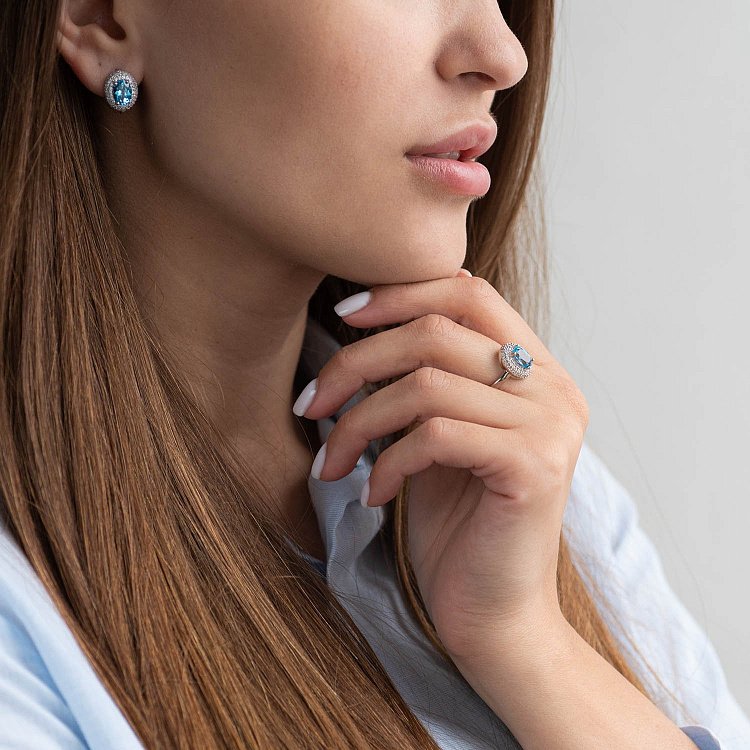 Золоті сережки з блакитним топазом і фіанітами с04201 від ювелірного магазину Онікс - 1