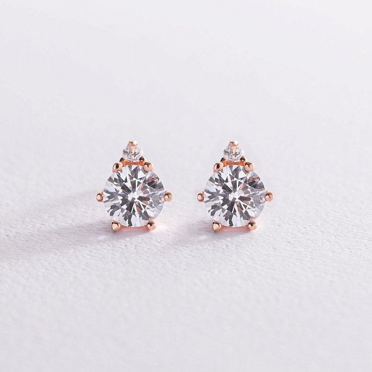 Золоті сережки - пусети з фіанітами с04082 від ювелірного магазину Онікс