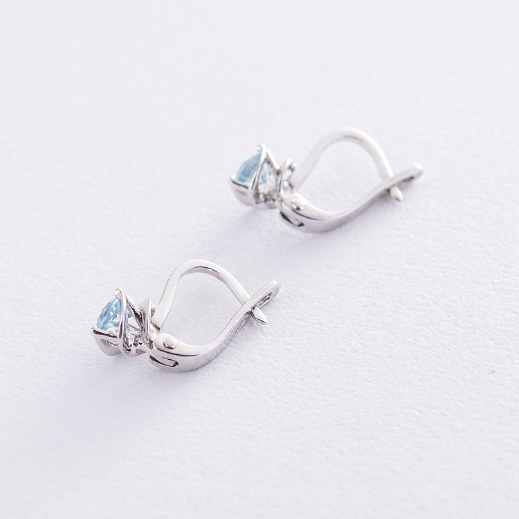 Золотые серьги с голубым топазом с02407 от ювелирного магазина Оникс - 2