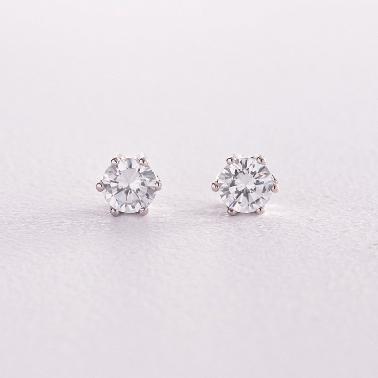 Срібні сережки - пусети з фіанітами 12623 від ювелірного магазину Онікс