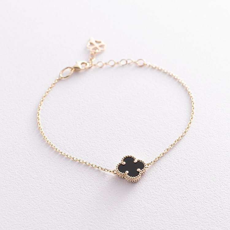 Золотий браслет "Конюшина" з оніксом б04392 від ювелірного магазину Онікс