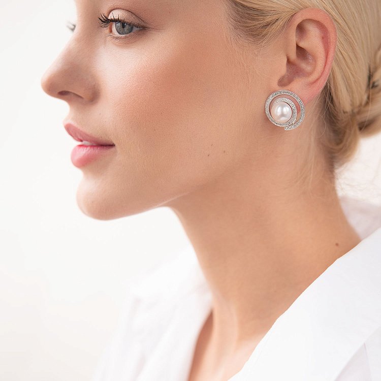 Золоті сережки "Кругообіг" з діамантами і перлами c1021 від ювелірного магазину Онікс - 2