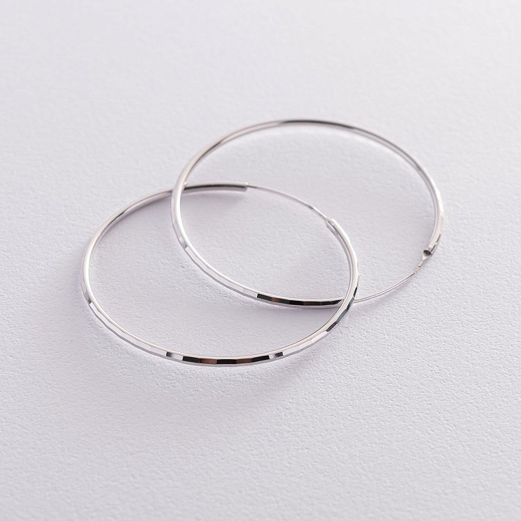 Сережки - кільця в сріблі (4.9 см) 122944 від ювелірного магазину Онікс