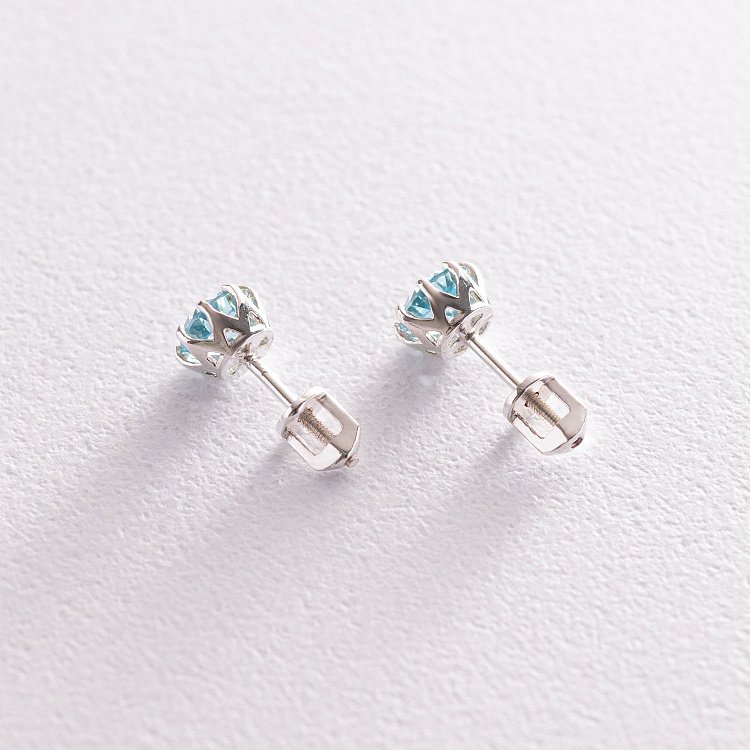 Срібні сережки - пусети (син. топази) 122855 від ювелірного магазину Онікс - 6