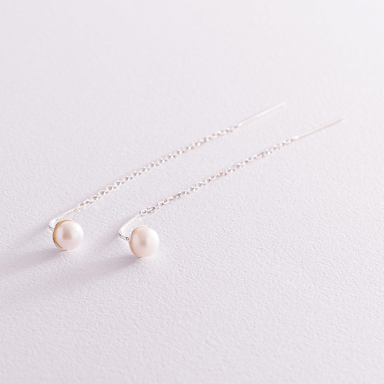 Срібні сережки - протяжки з перлами 123104 від ювелірного магазину Онікс - 1