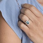Золотое кольцо с голубым топазом и фианитами к04647 от ювелирного магазина Оникс - 1