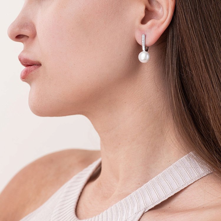 Срібні сережки з перлами і фіанітами 2453/1р-PWT від ювелірного магазину Онікс - 1