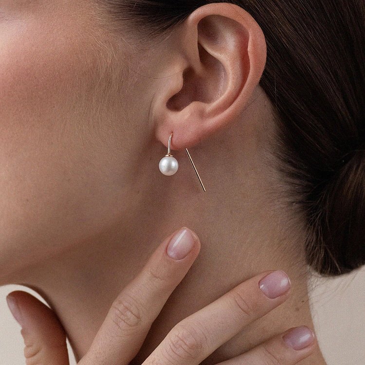 Золотые серьги "Изящность" (жемчуг) с07341 от ювелирного магазина Оникс