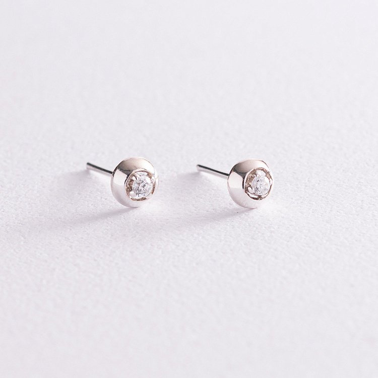 Срібні сережки - пусети з фіанітами 12852 від ювелірного магазину Онікс