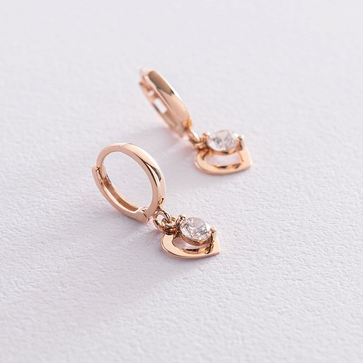 Золотые серьги "Сердечки" с фианитами с07346 от ювелирного магазина Оникс - 1