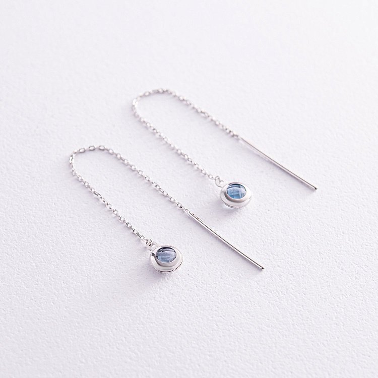 Золоті сережки - протяжки з топазами с07964 від ювелірного магазину Онікс