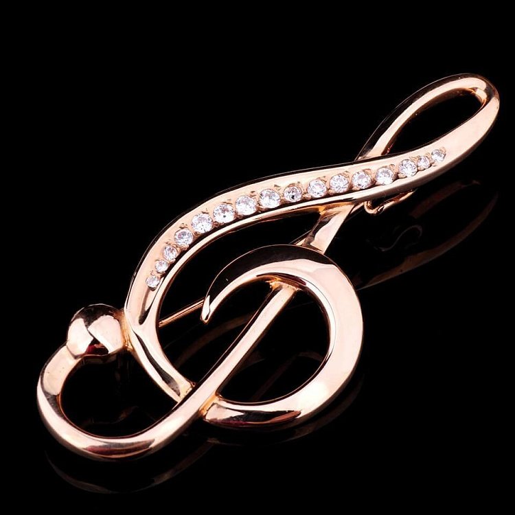 Золота брошка "Скрипковий ключ" зак00122 від ювелірного магазину Онікс