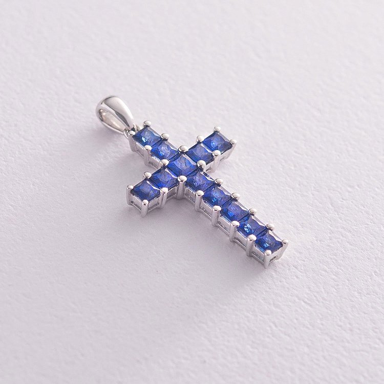 Золотой крестик с синими сапфирами п216 от ювелирного магазина Оникс