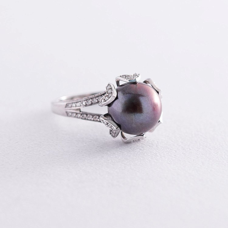 Золота каблучка з перлиною і діамантами 7017075 від ювелірного магазину Онікс