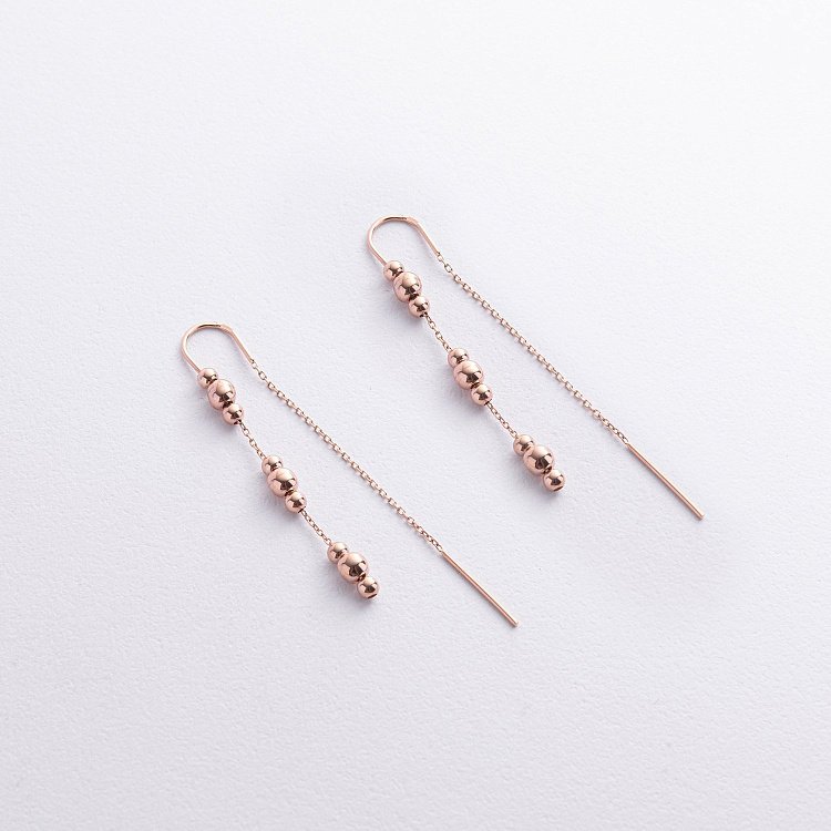 Золоті висячі сережки з кульками (протяжки) с09263 від ювелірного магазину Онікс