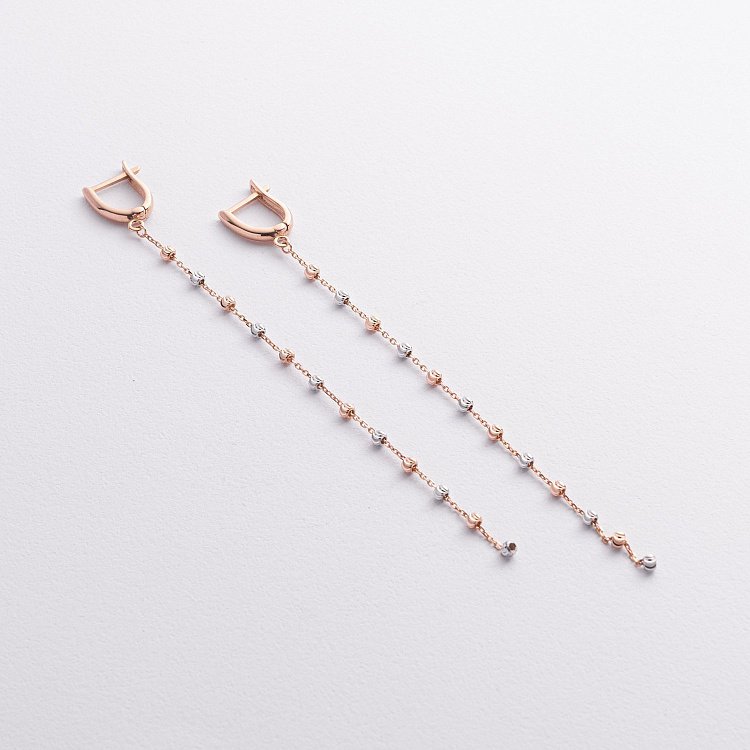 Сережки "Кульки на ланцюжку" (червоне, біле золото) с09371 від ювелірного магазину Онікс