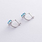 Золоті сережки з блакитним топазом і діамантами C01083E от ювелирного магазина Оникс - 2
