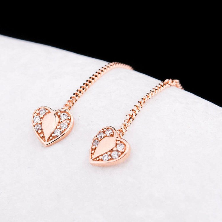 Золоті сережки "Серця" з фіанітами с02934 від ювелірного магазину Онікс