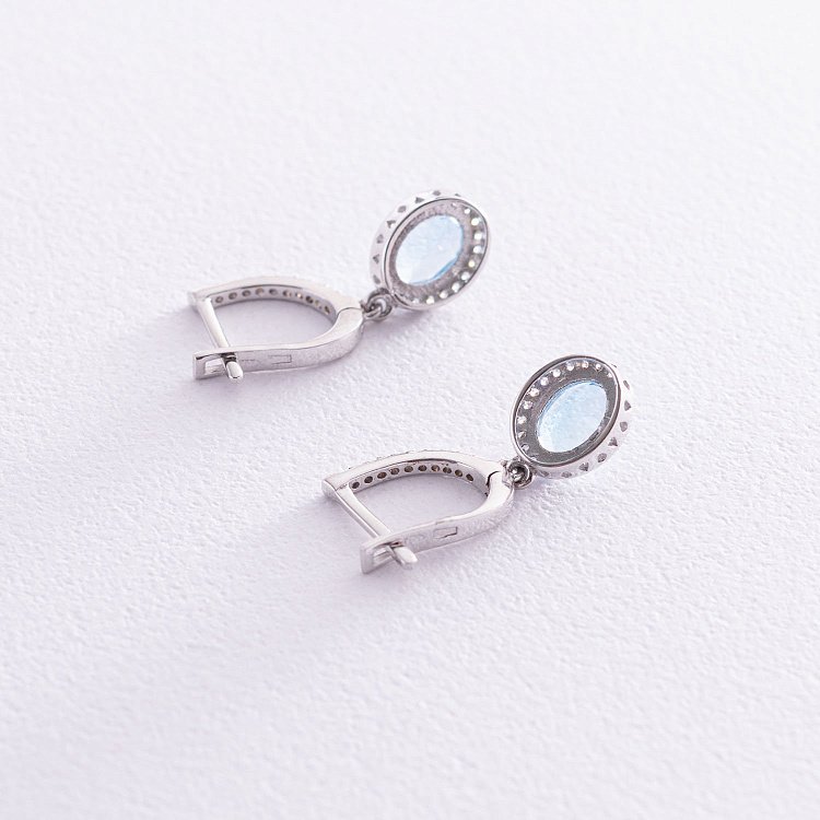 Золотые серьги с голубым топазом и фианитами с04690 от ювелирного магазина Оникс - 2