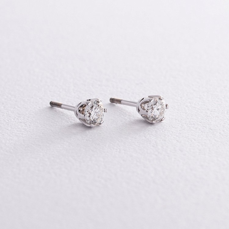 Золотые серьги - пусеты с бриллиантами 36861121 от ювелирного магазина Оникс