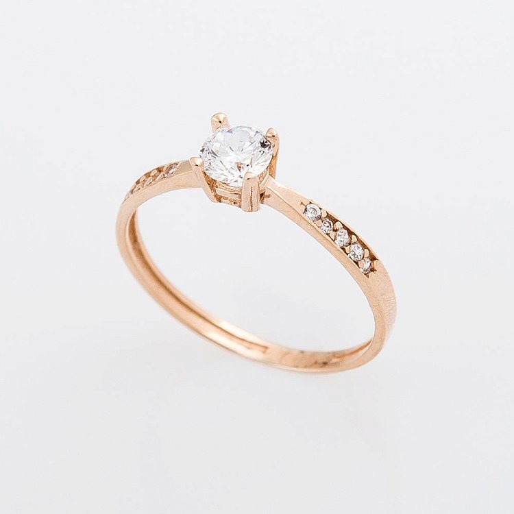 Золотое помолвочное кольцо с фианитами к04211 от ювелирного магазина Оникс