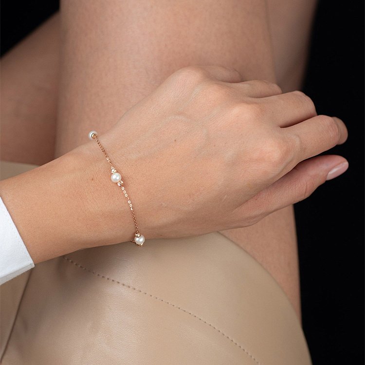 Золотий браслет з перлинками б04393 від ювелірного магазину Онікс - 1