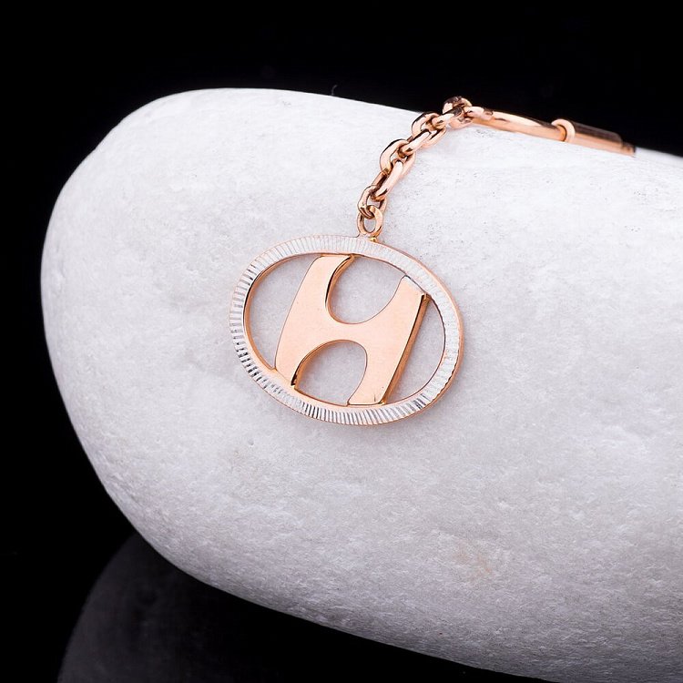 Золотий брелок "Hyundai-Хюндай" бр00001хонда від ювелірного магазину Онікс