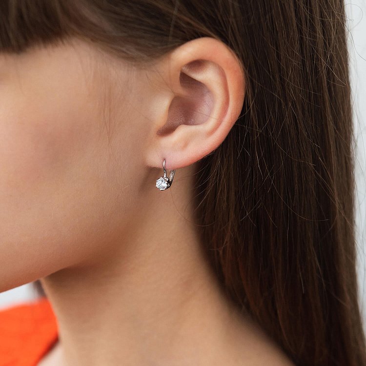 Золоті сережки з фіанітами с05963 від ювелірного магазину Онікс - 1