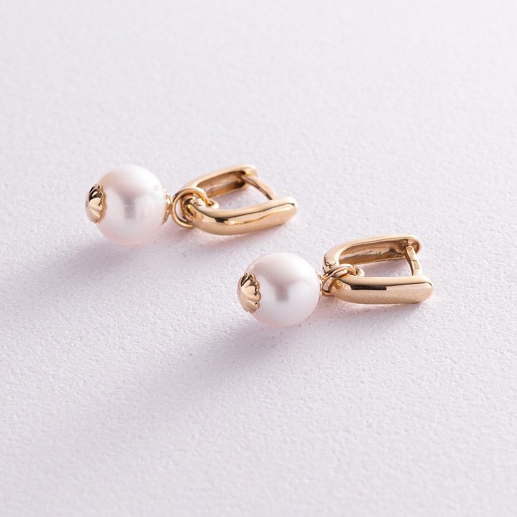 Золоті сережки з культ. прісн. перлами с04954 від ювелірного магазину Онікс