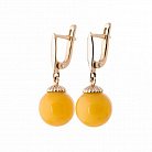 Золоті сережки "Кульки" з бурштином с03647 от ювелирного магазина Оникс