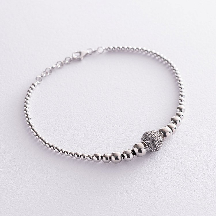 Золотий браслет з кульками (фіаніти) б03581 від ювелірного магазину Онікс