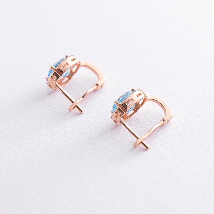 Золоті сережки з топазом і фіанітами с04190 від ювелірного магазину Онікс - 2