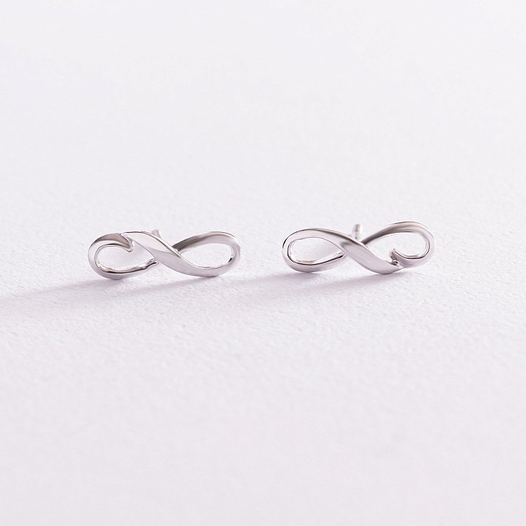 Сережки - пусети "Нескінченність" в білому золоті с07764 від ювелірного магазину Онікс