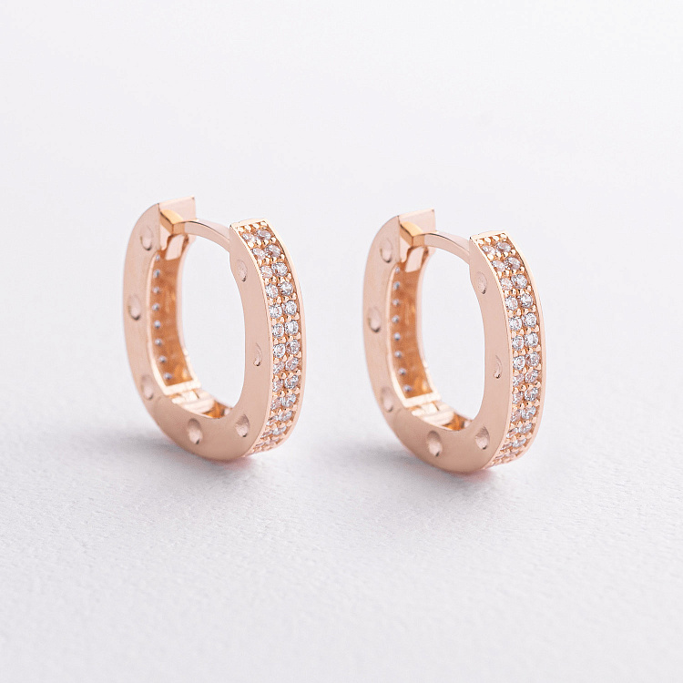 Золоті сережки з фіанітами с09135 від ювелірного магазину Онікс