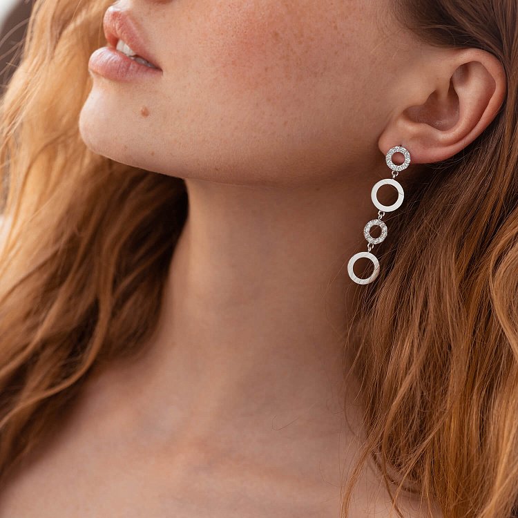 Золоті сережки - пусети "Кругообіг" з діамантами 36871121 від ювелірного магазину Онікс