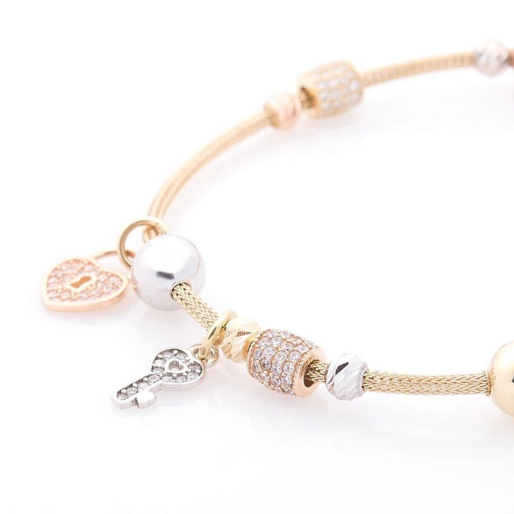 Золотой браслет "Сердечко с ключиком" (фианит) б04006 от ювелирного магазина Оникс - 1